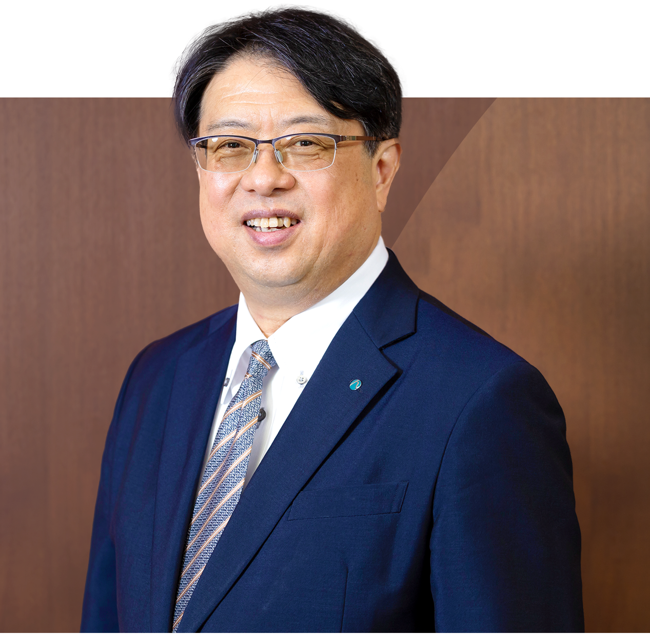 広交グループ代表 前 泰弘